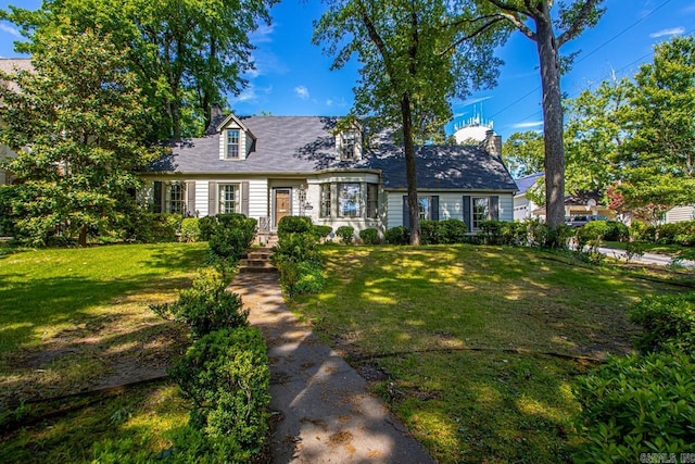 2424 N Fillmore St, Little Rock, AR 72207 - cape cod house with a front yard