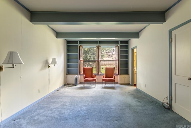 2424 N Fillmore St, Little Rock, AR 72207 - living area with carpet, built in shelves, beamed ceiling, and baseboards