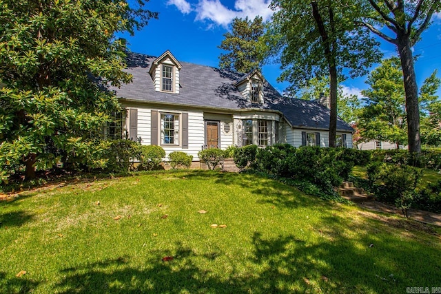 2424 N Fillmore St, Little Rock, AR 72207 - cape cod home featuring a front lawn