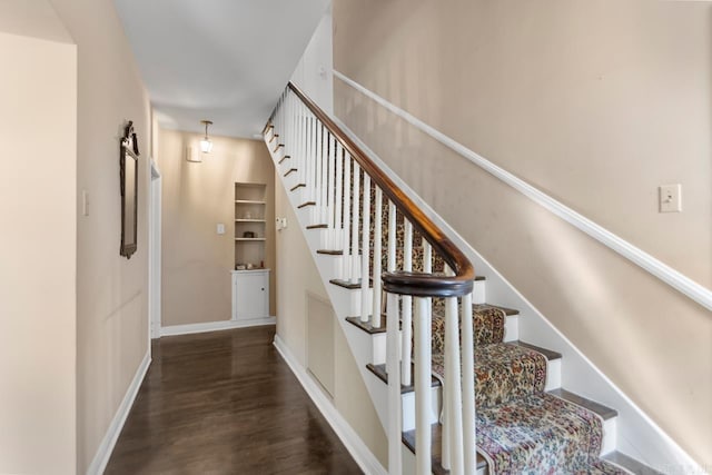 2424 N Fillmore St, Little Rock, AR 72207 - stairway featuring wood finished floors and baseboards