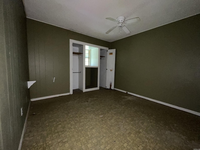 1602 Harmon Dr, Benton, AR 72015 - unfurnished bedroom with baseboards and a ceiling fan