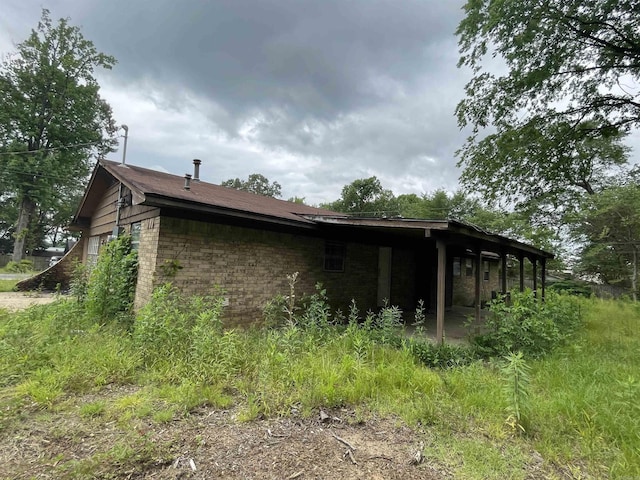 1602 Harmon Dr, Benton, AR 72015 - view of side of property with brick siding