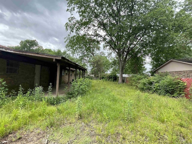1602 Harmon Dr, Benton, AR 72015 - view of yard featuring a patio area