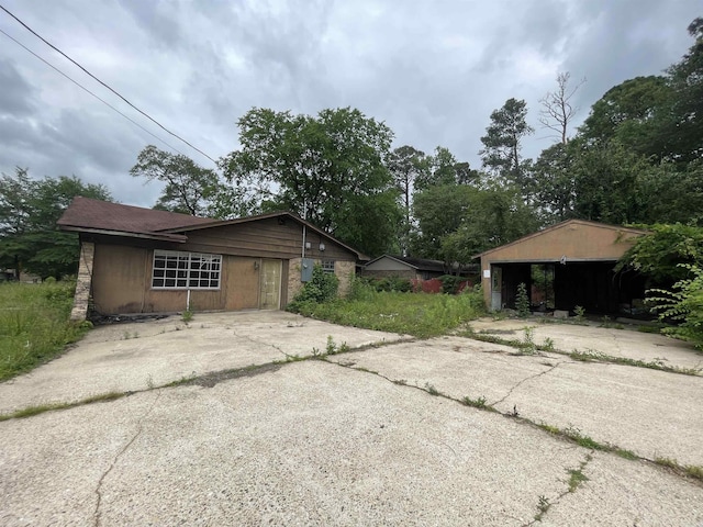 1602 Harmon Dr, Benton, AR 72015 - view of home's exterior with an outdoor structure