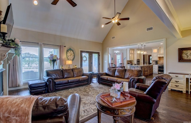 225 Wortham Rd, Rose Bud, AR 72137 - living room with ceiling fan, a chandelier, high vaulted ceiling, dark wood finished floors, and ornamental molding
