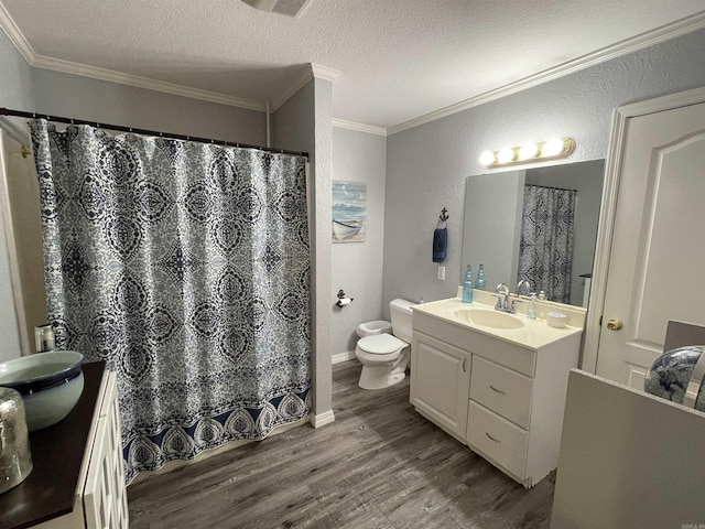 142 Timber Ridge Ln, El Dorado, AR 71730 - full bathroom with wood finished floors, vanity, crown molding, toilet, and a textured ceiling