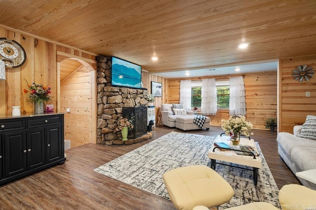 4915 Albert Pike Rd, Hot Springs, AR 71913 - living area featuring a fireplace, wood ceiling, wood finished floors, wooden walls, and arched walkways