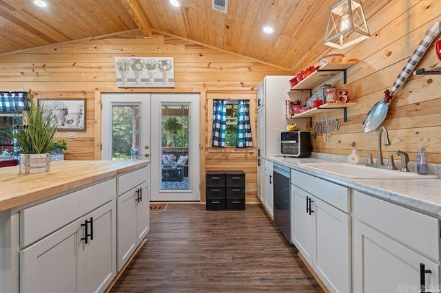 4915 Albert Pike Rd, Hot Springs, AR 71913 - kitchen with a sink, wood walls, wood ceiling, dark wood-style flooring, and butcher block counters