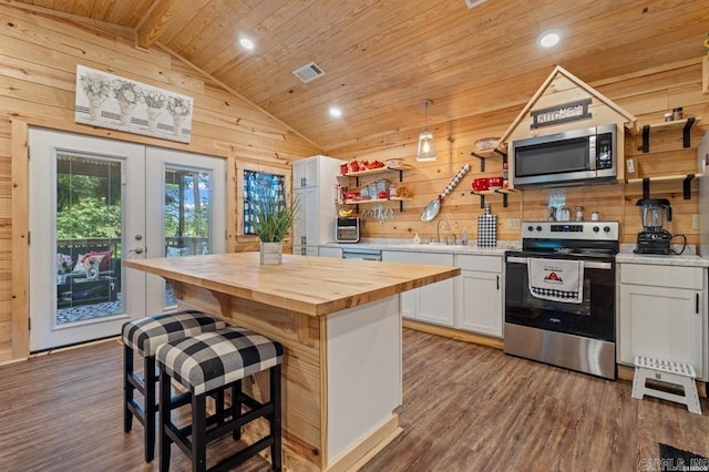 4915 Albert Pike Rd, Hot Springs, AR 71913 - kitchen with appliances with stainless steel finishes, wood counters, dark wood-style floors, white cabinetry, and wood ceiling