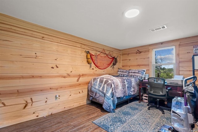 4915 Albert Pike Rd, Hot Springs, AR 71913 - bedroom featuring wooden walls and wood finished floors