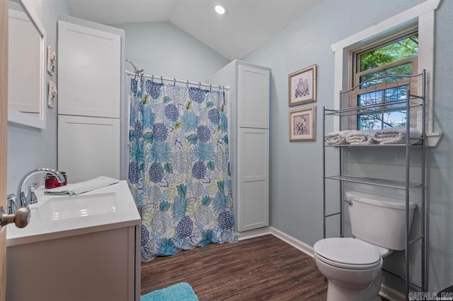 4915 Albert Pike Rd, Hot Springs, AR 71913 - full bathroom with wood finished floors, toilet, vanity, lofted ceiling, and baseboards