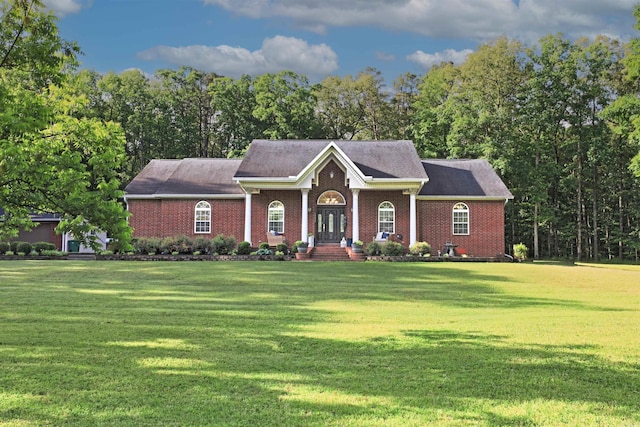 900 Anderson Ave, White Hall, AR 71602 - neoclassical / greek revival house with a front lawn and brick siding