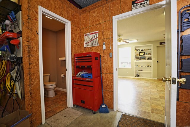 900 Anderson Ave, White Hall, AR 71602 - bathroom with toilet, ceiling fan, and built in shelves