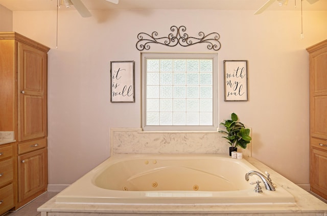 900 Anderson Ave, White Hall, AR 71602 - bathroom featuring a ceiling fan and a whirlpool tub