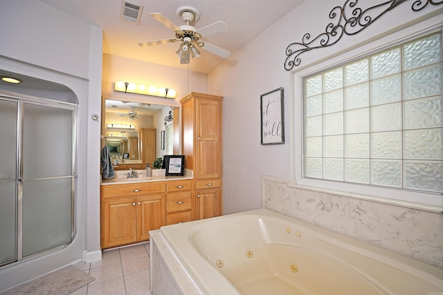 900 Anderson Ave, White Hall, AR 71602 - bathroom with a ceiling fan, a stall shower, tile patterned flooring, and a tub with jets