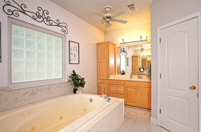900 Anderson Ave, White Hall, AR 71602 - bathroom with a ceiling fan, vanity, a tub with jets, and tile patterned flooring