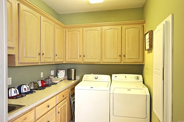 900 Anderson Ave, White Hall, AR 71602 - clothes washing area with cabinet space and washing machine and dryer