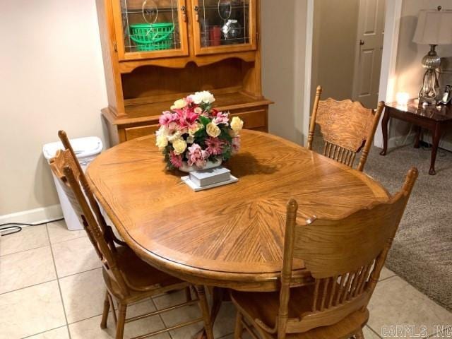 8 Tombstone Ct, Little Rock, AR 72209 - dining area with light tile patterned flooring and baseboards