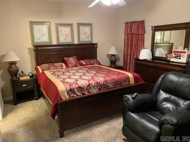 8 Tombstone Ct, Little Rock, AR 72209 - bedroom featuring light carpet and ceiling fan