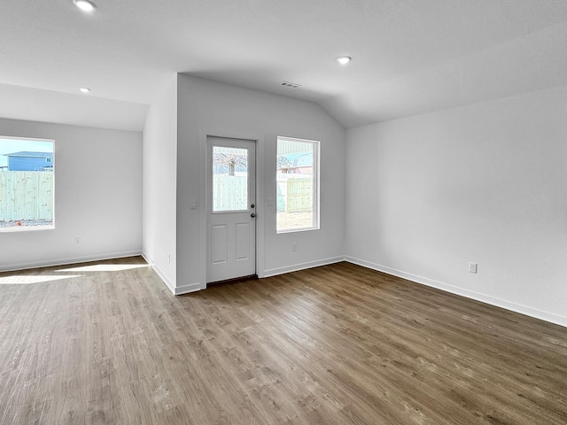 1513 Ridgefield Cir, Searcy, AR 72143 - entrance foyer featuring wood finished floors, baseboards, lofted ceiling, and recessed lighting