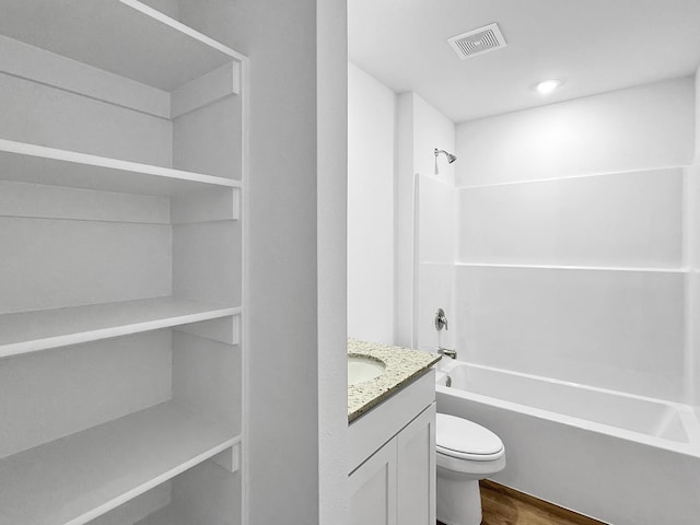 1513 Ridgefield Cir, Searcy, AR 72143 - bathroom with toilet, vanity, shower / bath combination, and wood finished floors