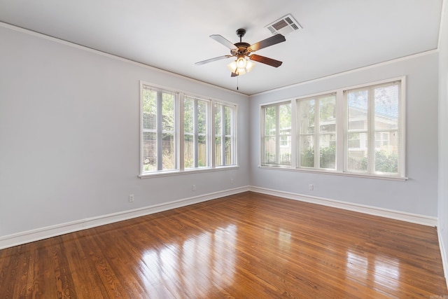 111 Midland St, Little Rock, AR 72205 - empty room with crown molding, baseboards, wood finished floors, and ceiling fan