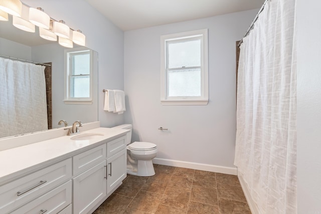 111 Midland St, Little Rock, AR 72205 - bathroom featuring vanity, toilet, and baseboards