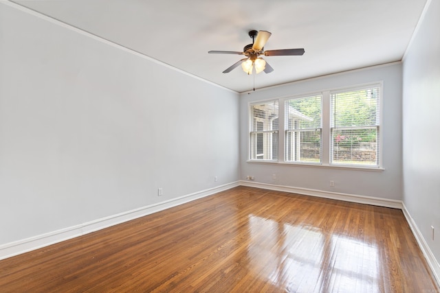 111 Midland St, Little Rock, AR 72205 - spare room featuring wood finished floors, ceiling fan, baseboards, and ornamental molding