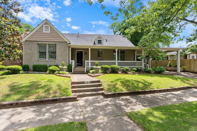 111 Midland St, Little Rock, AR 72205 - view of front facade with a porch and brick siding