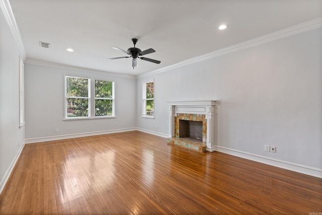 111 Midland St, Little Rock, AR 72205 - unfurnished living room with ceiling fan, wood finished floors, baseboards, a fireplace, and crown molding