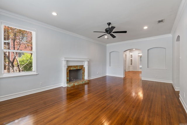 111 Midland St, Little Rock, AR 72205 - unfurnished living room with arched walkways, a ceiling fan, wood finished floors, baseboards, and recessed lighting