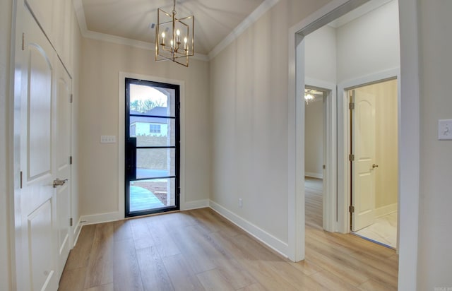 173 Maumelle Valley Dr, Maumelle, AR 72113 - foyer with light wood-style flooring, crown molding, a chandelier, and baseboards