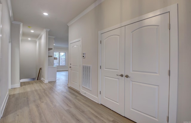 173 Maumelle Valley Dr, Maumelle, AR 72113 - hall featuring an upstairs landing, crown molding, baseboards, light wood-style flooring, and recessed lighting