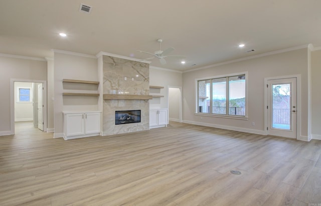 173 Maumelle Valley Dr, Maumelle, AR 72113 - unfurnished living room with ceiling fan, ornamental molding, healthy amount of natural light, light wood-style flooring, and recessed lighting