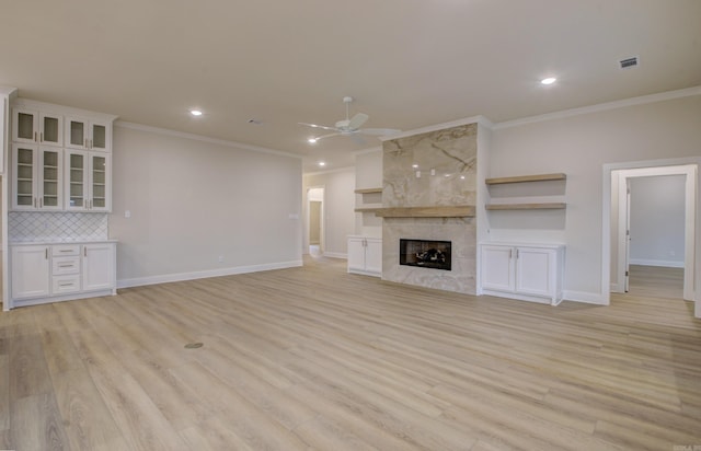 173 Maumelle Valley Dr, Maumelle, AR 72113 - unfurnished living room with ornamental molding, ceiling fan, light wood-type flooring, recessed lighting, and baseboards
