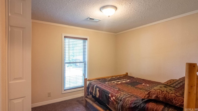 618 N 9th St, Thayer, MO 65791 - bedroom featuring a textured ceiling, dark carpet, crown molding, and baseboards