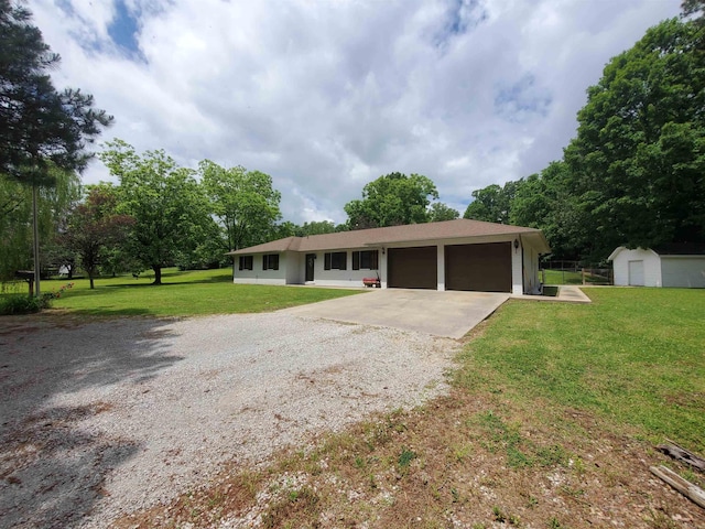 800 Hilltop Dr, Piggott, AR 72454 - single story home with gravel driveway, an attached garage, a front lawn, a storage unit, and an outdoor structure