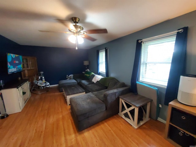 800 Hilltop Dr, Piggott, AR 72454 - living room featuring light wood-type flooring and a ceiling fan