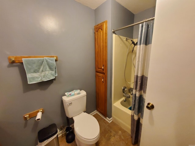 800 Hilltop Dr, Piggott, AR 72454 - bathroom with toilet, shower / bathtub combination with curtain, tile patterned flooring, and baseboards