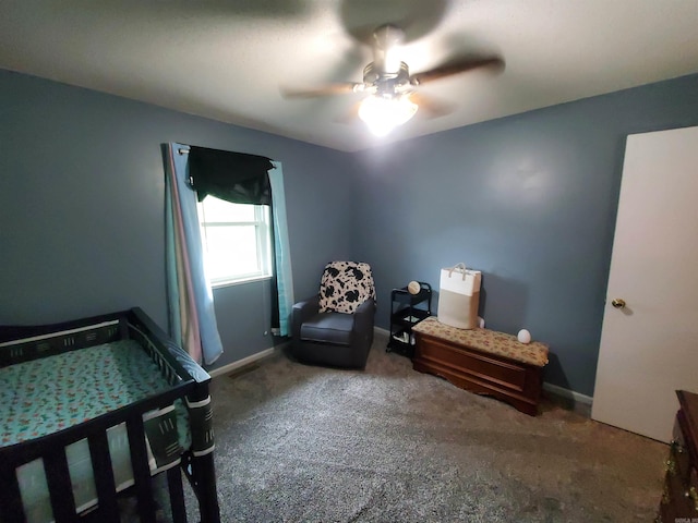 800 Hilltop Dr, Piggott, AR 72454 - carpeted bedroom featuring a ceiling fan and baseboards
