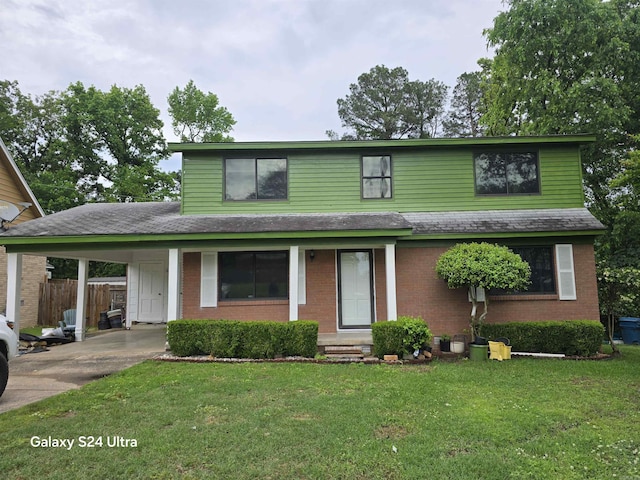 traditional home with an attached carport, brick siding, driveway, and roof with shingles