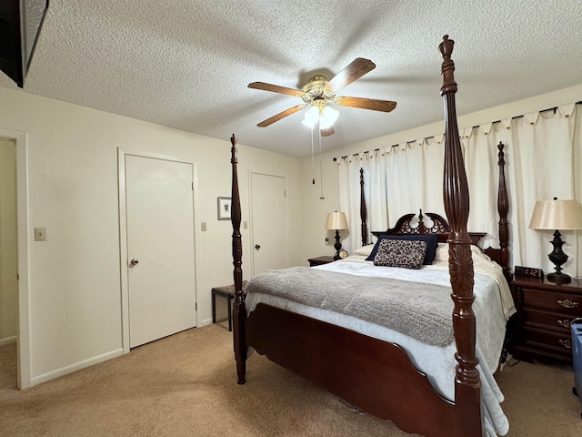 7 Minentonka Dr, Cherokee Village, AR 72529 - bedroom featuring light colored carpet, a textured ceiling, ceiling fan, and baseboards