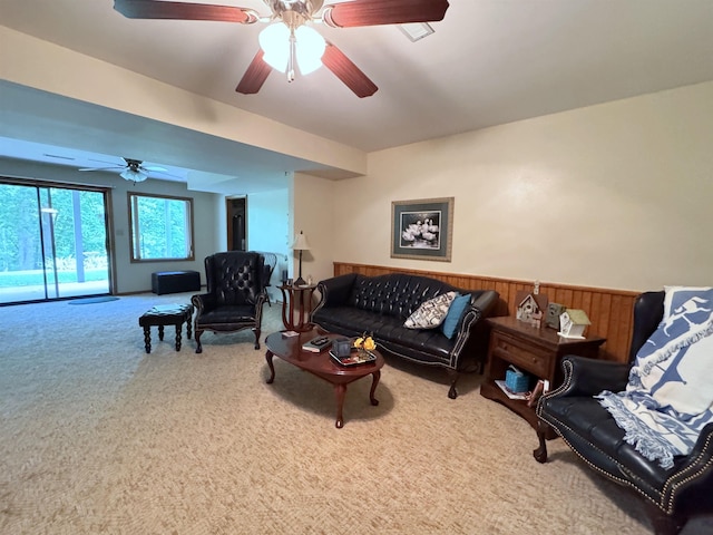 7 Minentonka Dr, Cherokee Village, AR 72529 - living room with carpet floors, ceiling fan, and a wainscoted wall