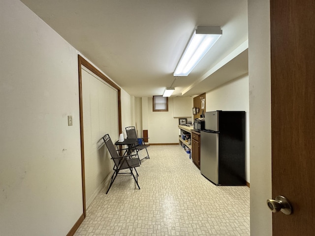 7 Minentonka Dr, Cherokee Village, AR 72529 - kitchen with freestanding refrigerator, baseboards, and light floors