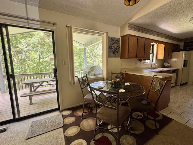 7 Minentonka Dr, Cherokee Village, AR 72529 - dining room with a textured ceiling and baseboards