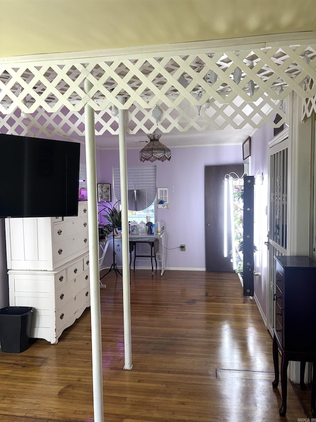 1222 Hendrix Ave, Little Rock, AR 72204 - bedroom with multiple windows, baseboards, and wood finished floors