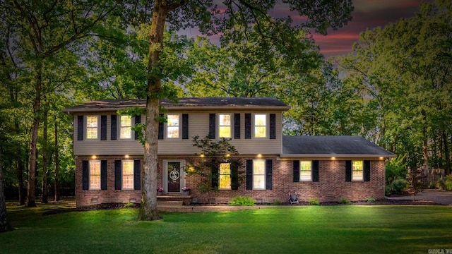 8 Cannon Ct, Little Rock, AR 72212 - colonial house featuring crawl space, a yard, and brick siding