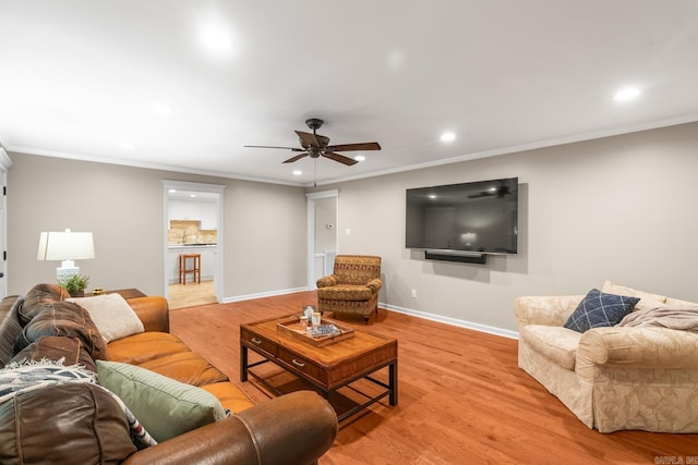 8 Cannon Ct, Little Rock, AR 72212 - living area with light wood finished floors, recessed lighting, a ceiling fan, baseboards, and crown molding