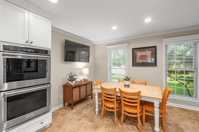 8 Cannon Ct, Little Rock, AR 72212 - dining space featuring crown molding, recessed lighting, and baseboards