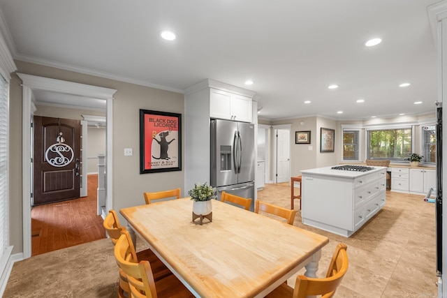 8 Cannon Ct, Little Rock, AR 72212 - dining space with crown molding, recessed lighting, baseboards, and light wood-style floors